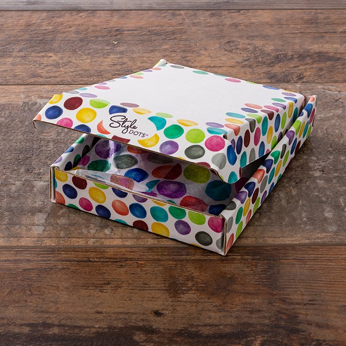 Polka dotted packaging for Dot Club by Style Dots.